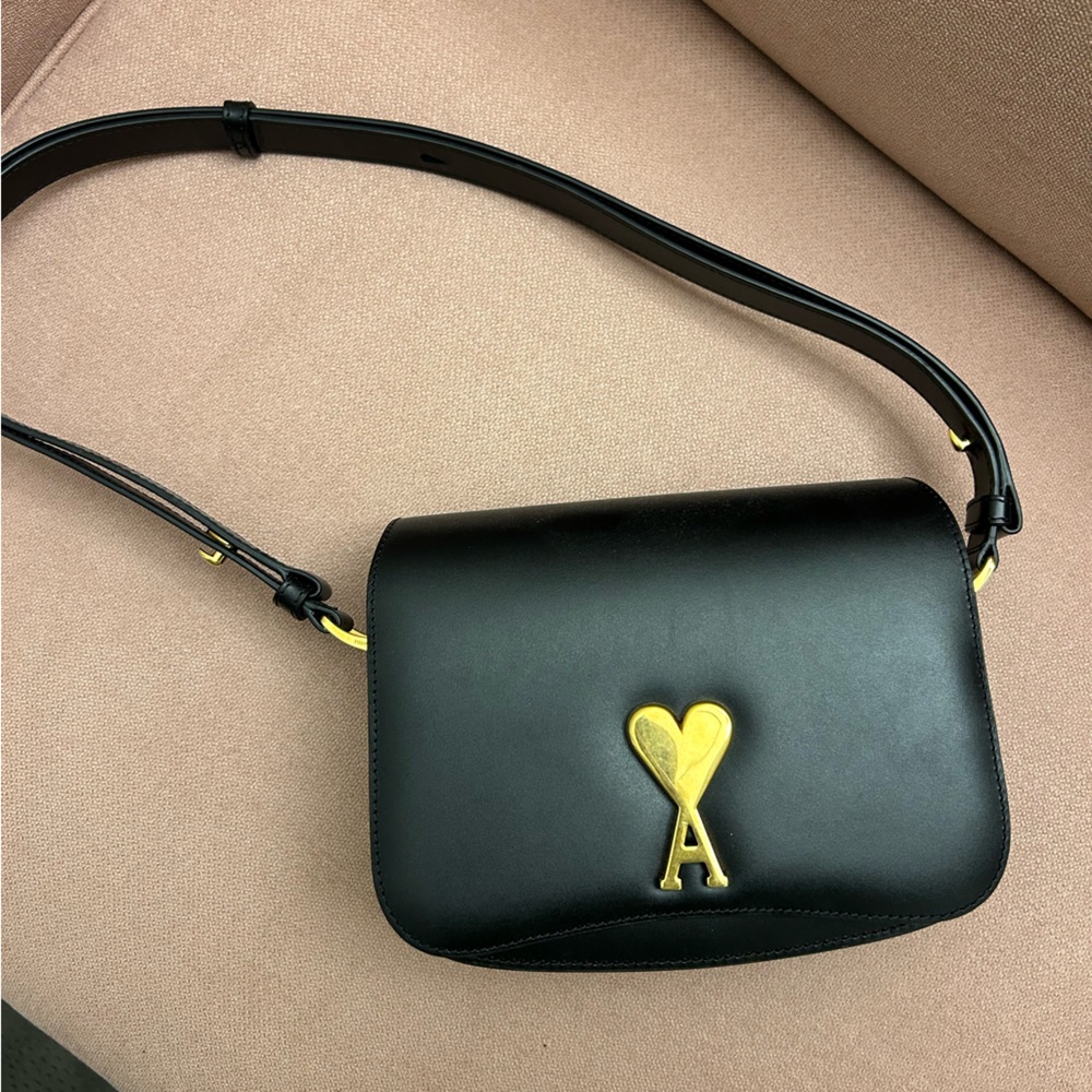Ami black shower bag. Adjustable strap. Worn once. Dust bag included
